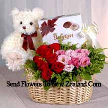 Basket Of Red And Pink Roses, A Box Of Chooclate And A Cute Teddy Bear Delivered in New Zealand