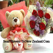 Bunch Of 7 Red Roses And A Medium Sized Cute Teddy Bear Delivered in New Zealand