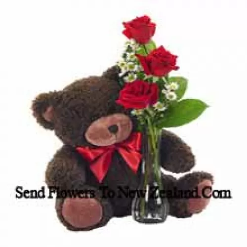3 Red Roses With Some Ferns In A Glass Vase Along With A Cute 14 Inches Tall Teddy Bear