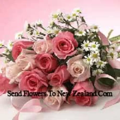 Bouquet de 11 roses roses avec statice pourpre